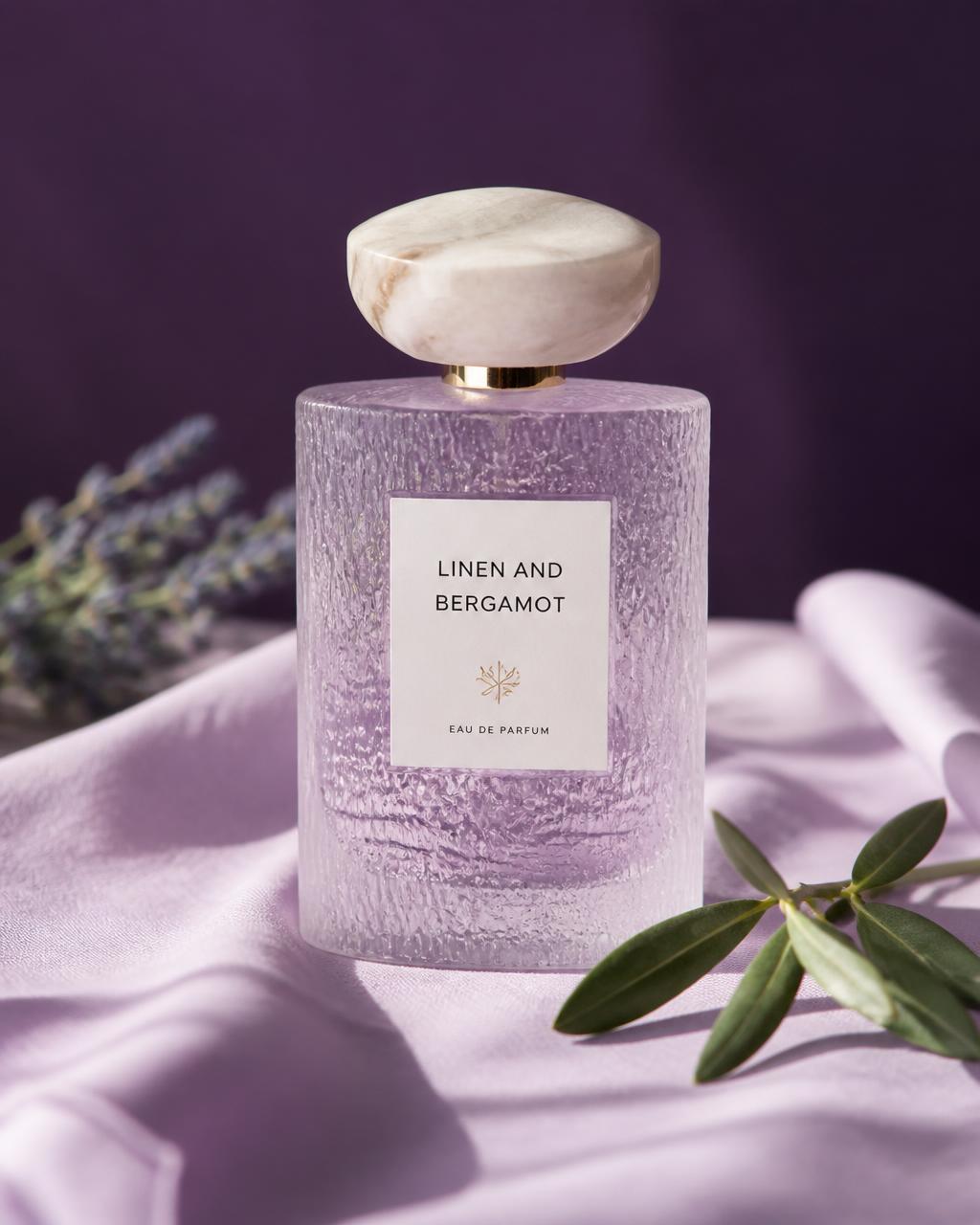 Textured glass bottle of Linen & Bergamot with pale lavender liquid and soft lighting